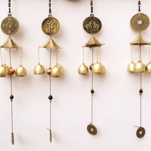 Tibetan blessing wind chimes collection with elephant, bagua, fortune coin, and fu character symbols on white background