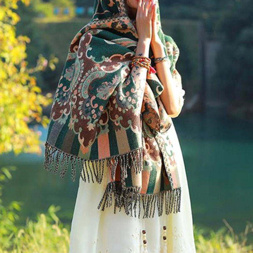 Tibetan blue botanical tassel shawl displaying complete jacquard pattern with vine leaf design