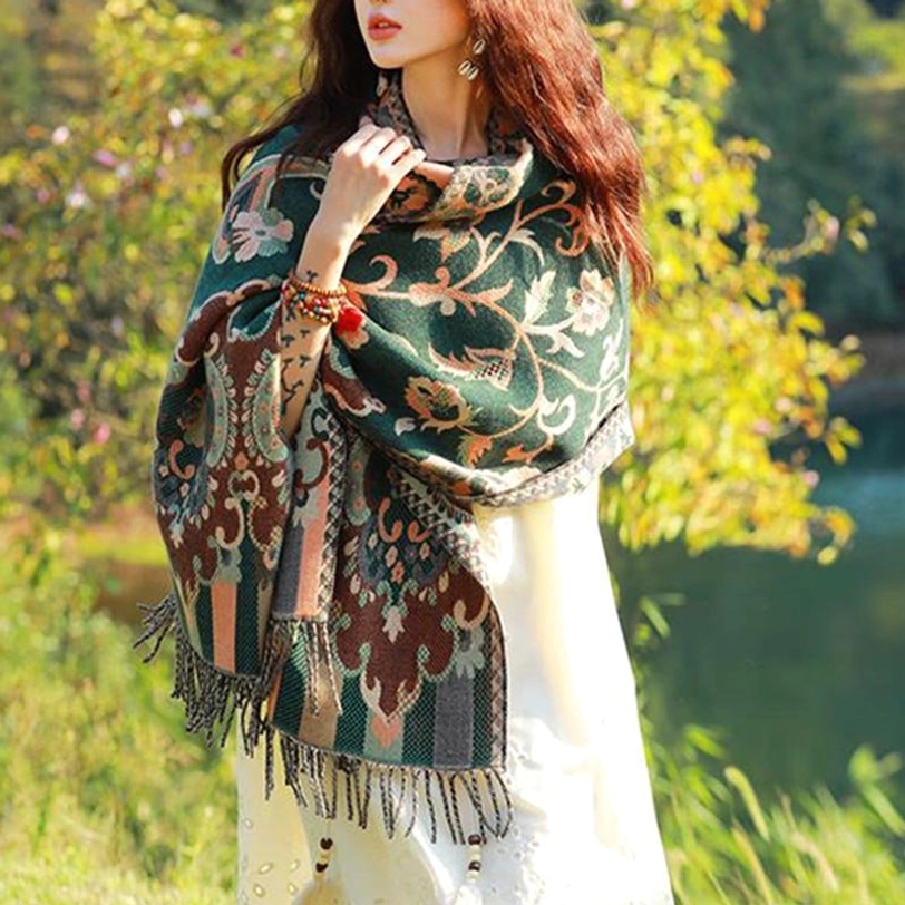 Tibetan botanical tassel shawl blue variant with traditional floral motifs and decorative hemming