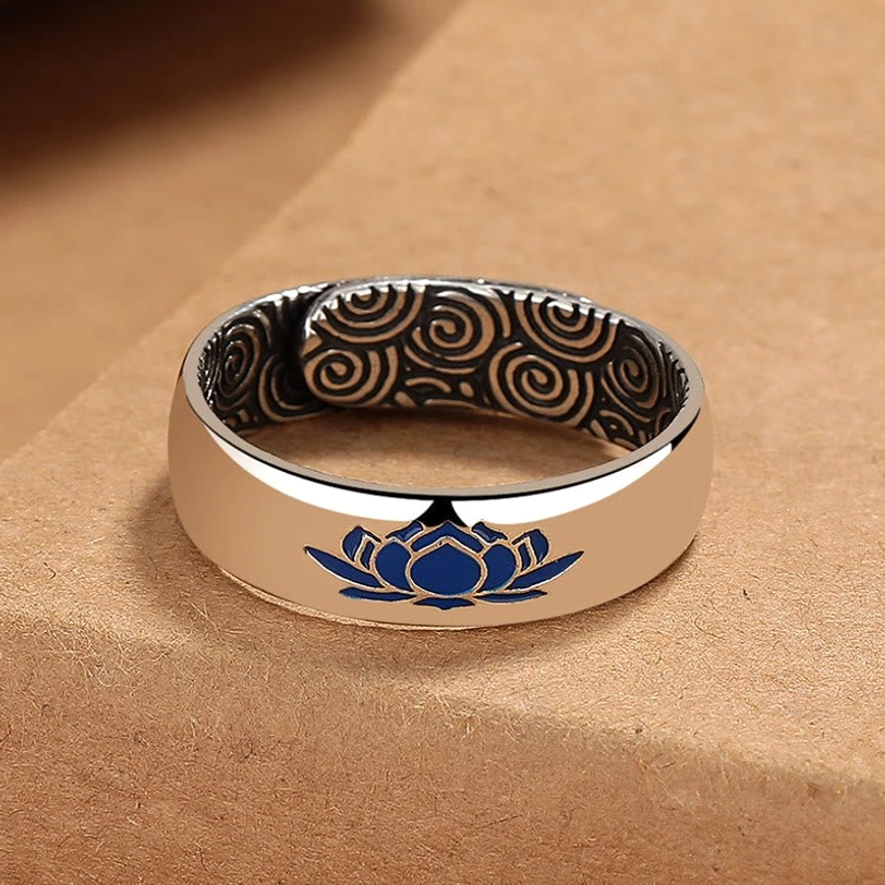 Blue lotus spiritual ring front view featuring vibrant enamel pattern and polished copper finish on kraft paper background