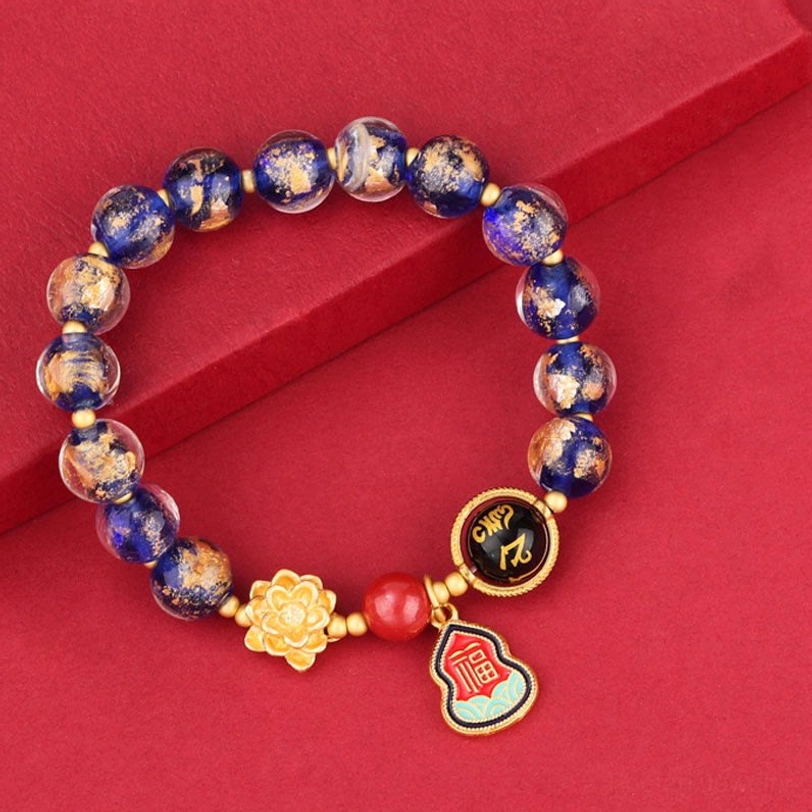 Blue spotted Liuli glass Tibetan Om Mani Padme Hum bracelet with Sanskrit charm bead and enamel pendant