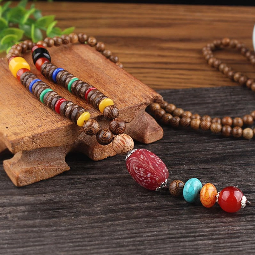 Tibetan bodhi seed necklace detail close-up showing thousand-eyed pattern texture and spiritual craftsmanship