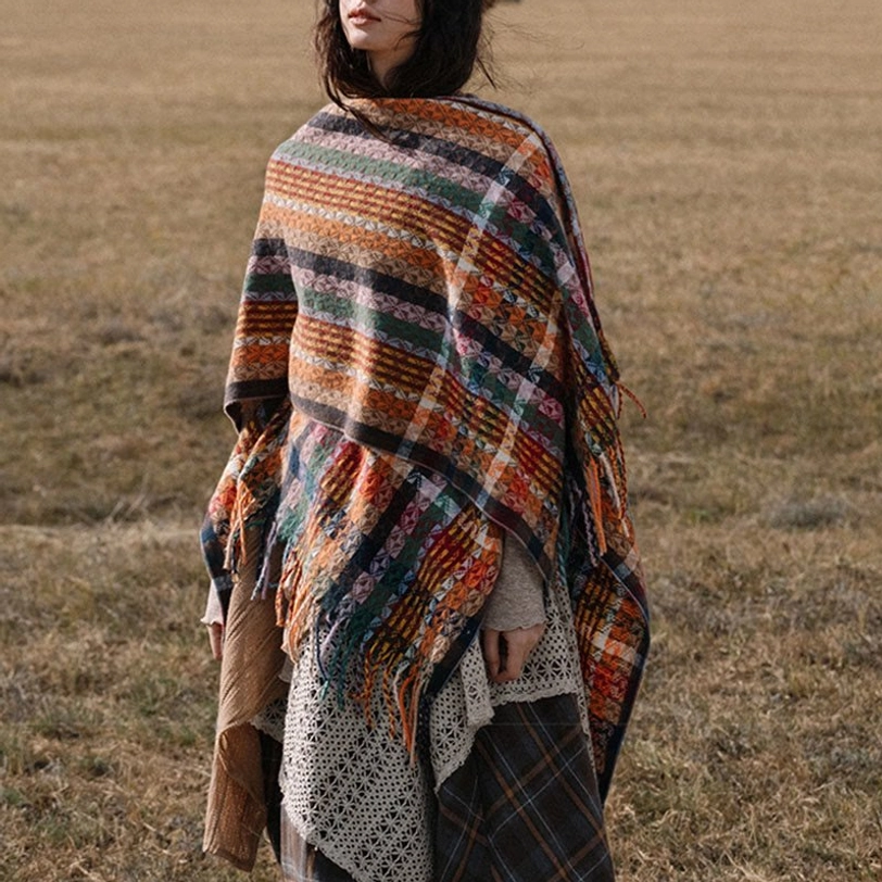 Tibetan bohemian tassel shawl detail shot showcasing colorful geometric stripe weave and handcrafted fringe texture