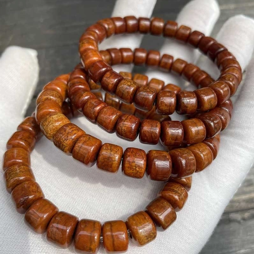 Multiple Tibetan bone bead bracelets polished finish without decorations overhead