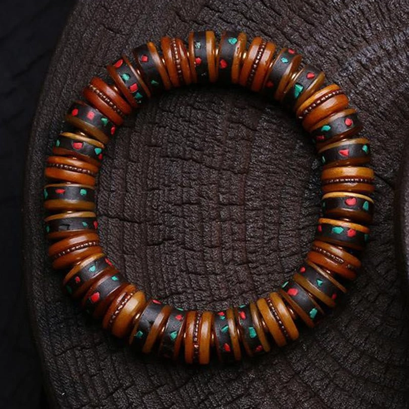 Artisan-crafted Tibetan bone skull bracelet showcasing traditional Buddhist memento mori symbolism and natural materials