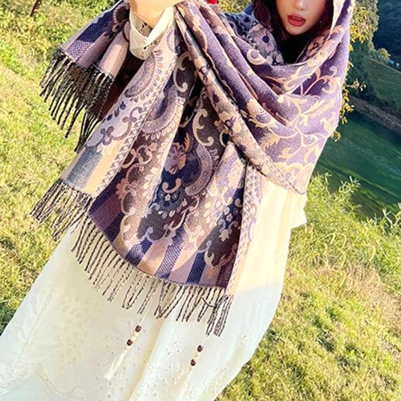 Tibetan botanical tassel shawl detail view of botanical jacquard and traditional tassel embellishment