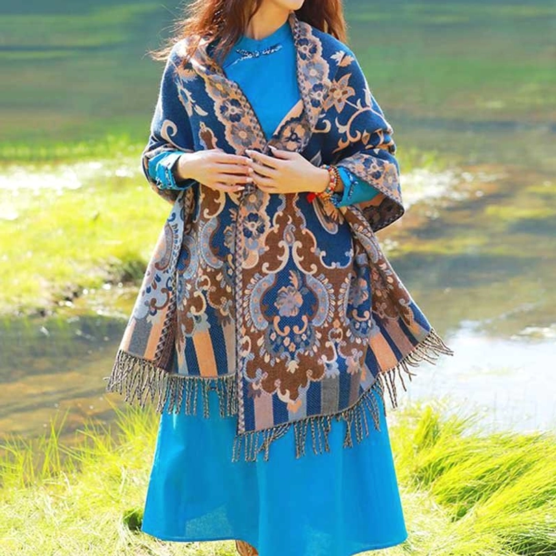 Tibetan botanical tassel shawl lifestyle shot showing versatile wear and botanical design patterns