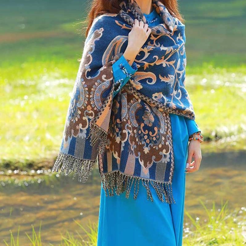 Tibetan leaf pattern botanical shawl material close-up showing cashmere-like softness and texture quality