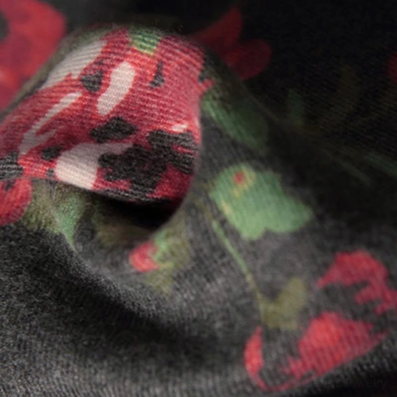 Tibetan rose and botanical patterned shawl showing rich color combinations and artistic design elements