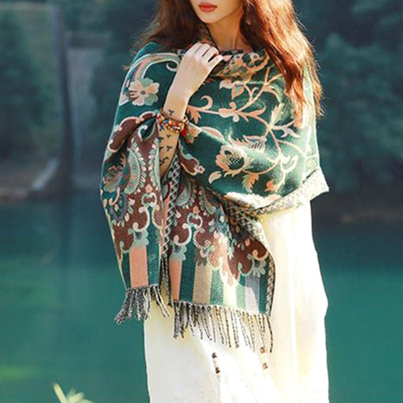 Tibetan botanical tassel shawl close-up detail of jacquard weave and vine leaf pattern texture