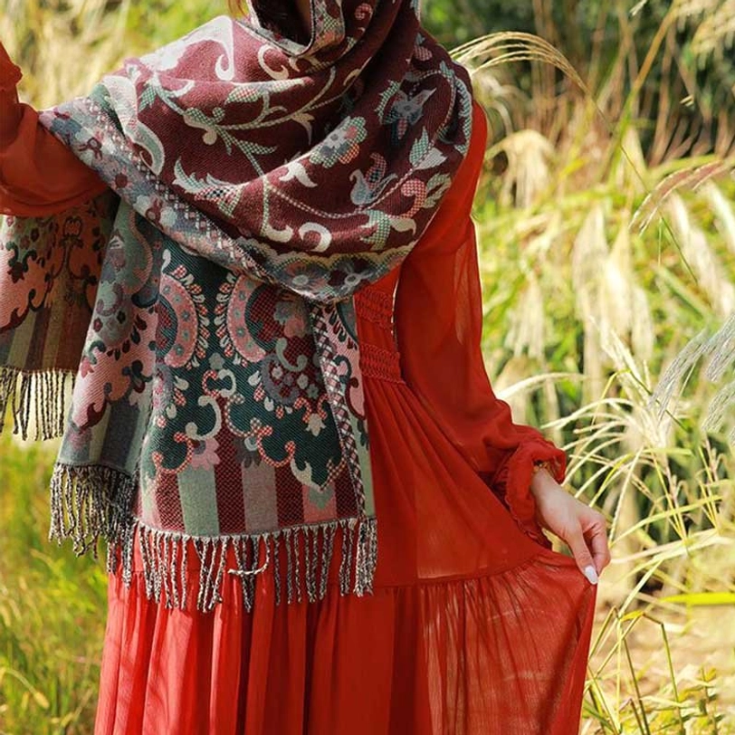 Tibetan botanical wrap shawl minimal draped styling showing coordinated print patterns on model shoulders