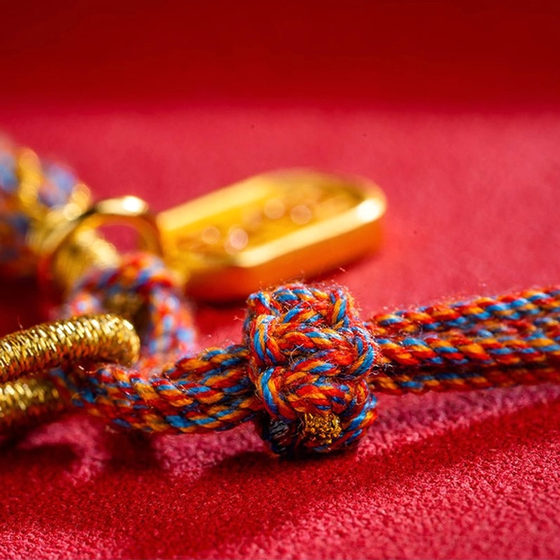 Tibetan braided bracelet knot adjustment mechanism with colorful woven rope and gold bead