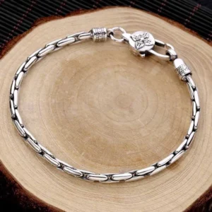 Antique silver tibetan Buddhist bracelet with engraved double dorje clasp detail