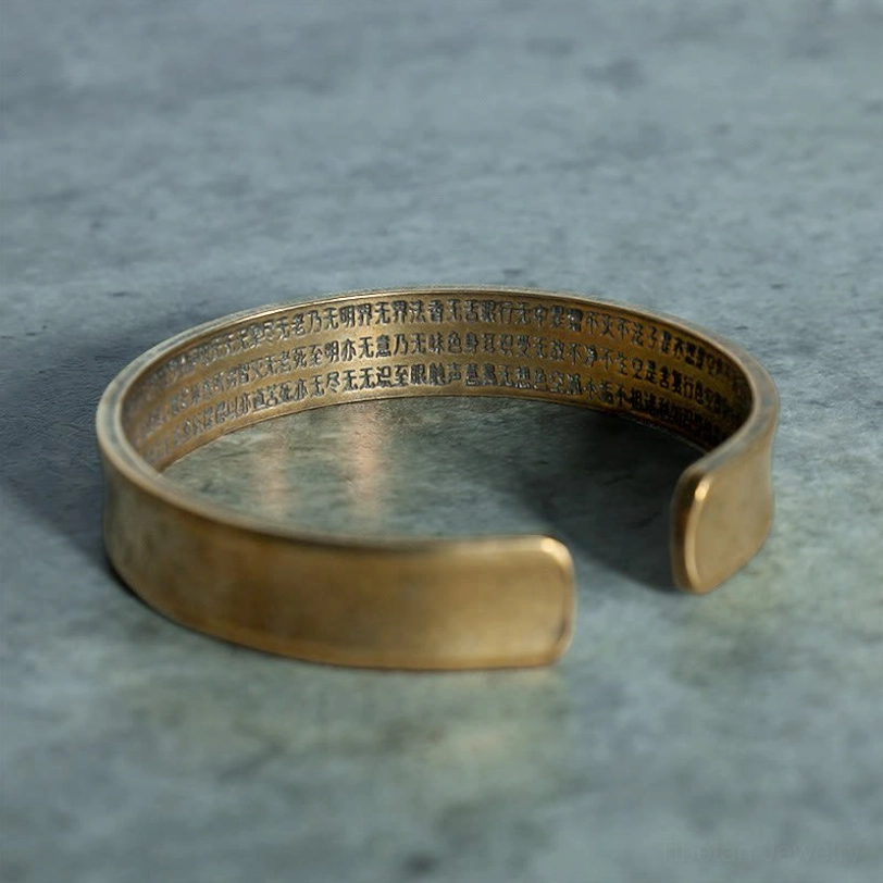 Inner surface of Tibetan bracelet fully engraved with Buddhist Heart Sutra Sanskrit text