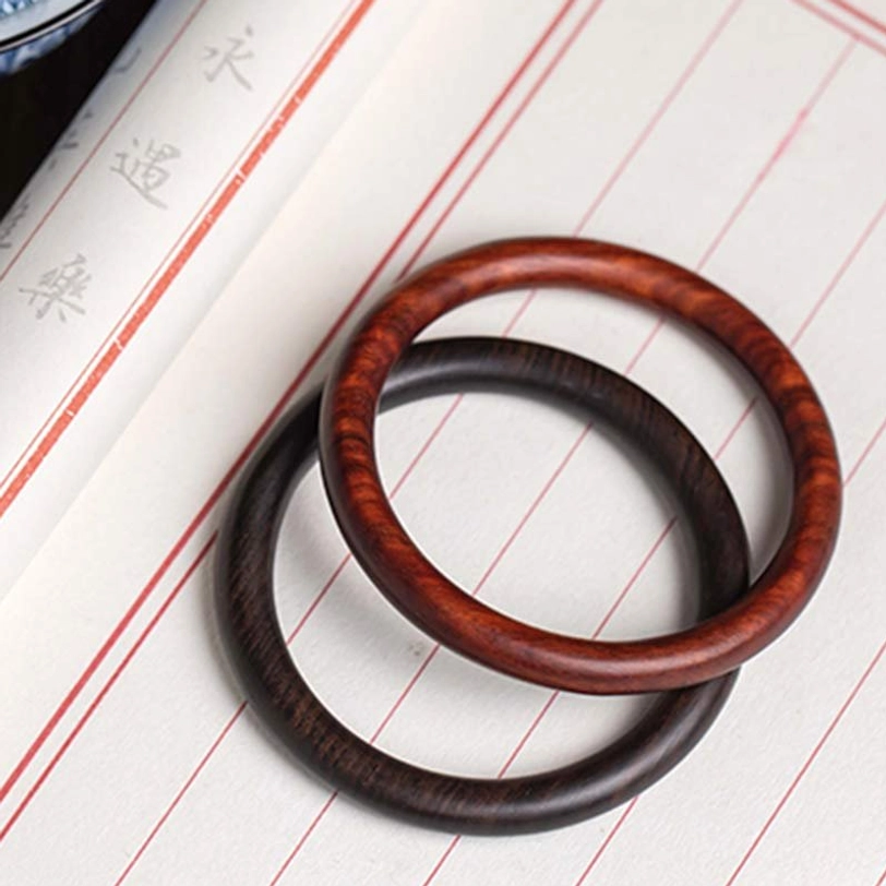 Close-up detail of Tibetan wood protection bracelet showing authentic natural wood texture and sustainable craftsmanship