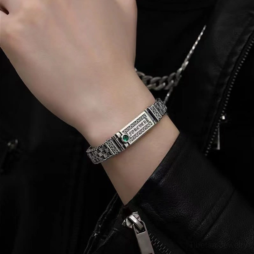 On-wrist wearing view of the Tibetan Om Mani Padme Hum copper bracelet, demonstrating natural fit and vintage silver-toned appearance on the wrist