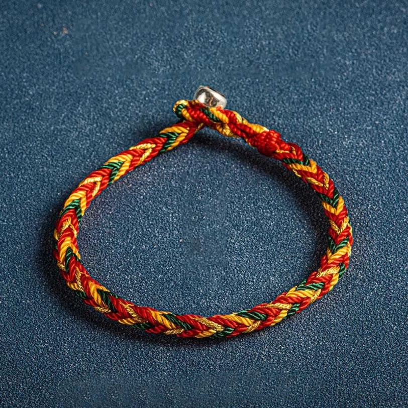 Orange dark green red Tibetan lucky bracelet style with braided threads and silver toggle closure