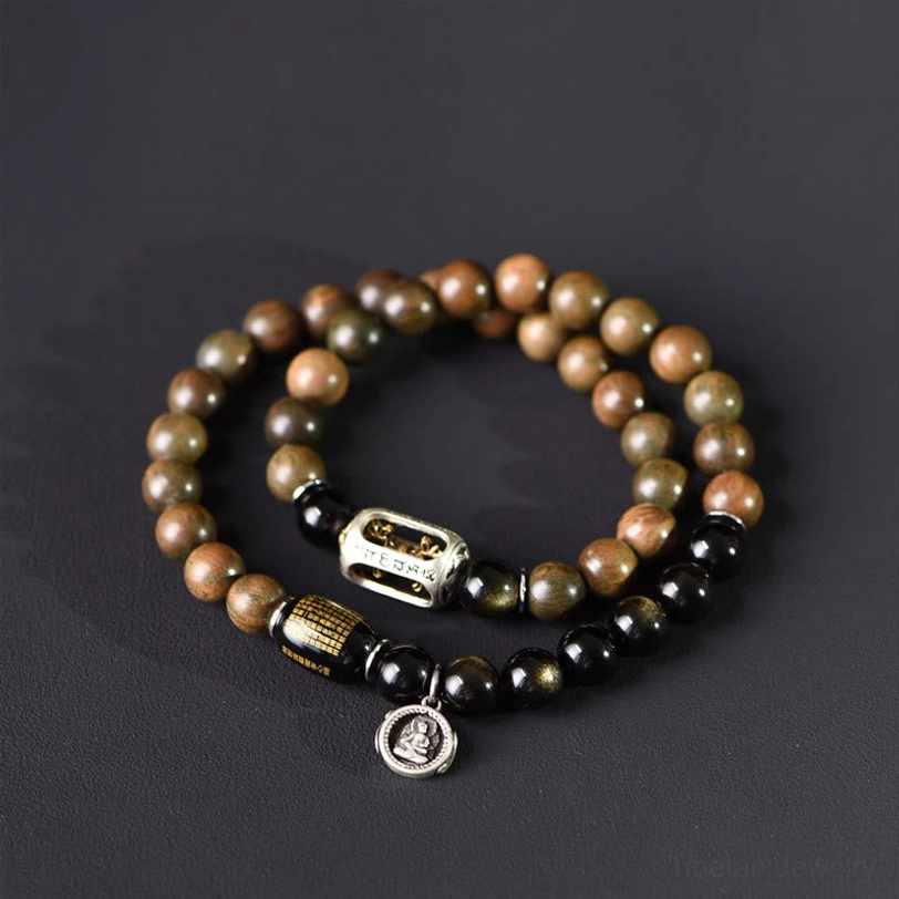 Tibetan healing bracelet side view with sandalwood and obsidian beads
