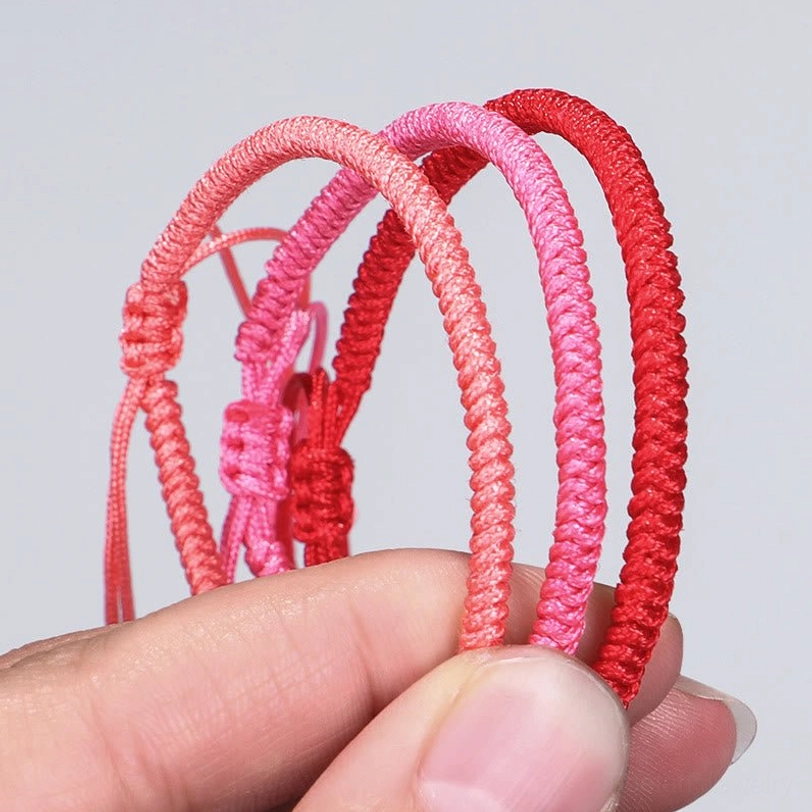 Tibetan braided protection bracelet on wrist showing comfortable fit and adjustable sizing for daily spiritual wear