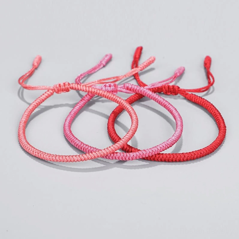 Tibetan braided bracelet set displaying multiple pieces layered together for enhanced spiritual protection and energy