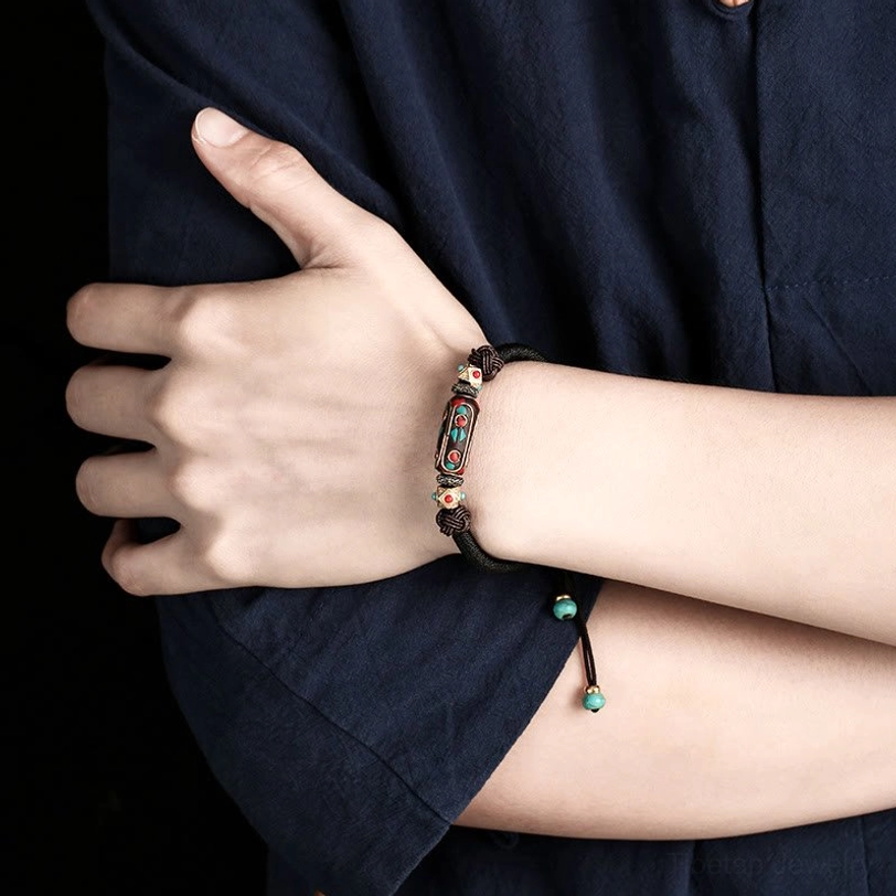 Multiple Tibetan braided bracelets collection showing color variety and handcrafted quality