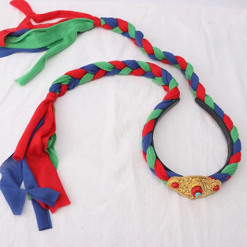 Tibetan braided hair headband with red green blue woven trim, fabric tassels and carved copper buckle