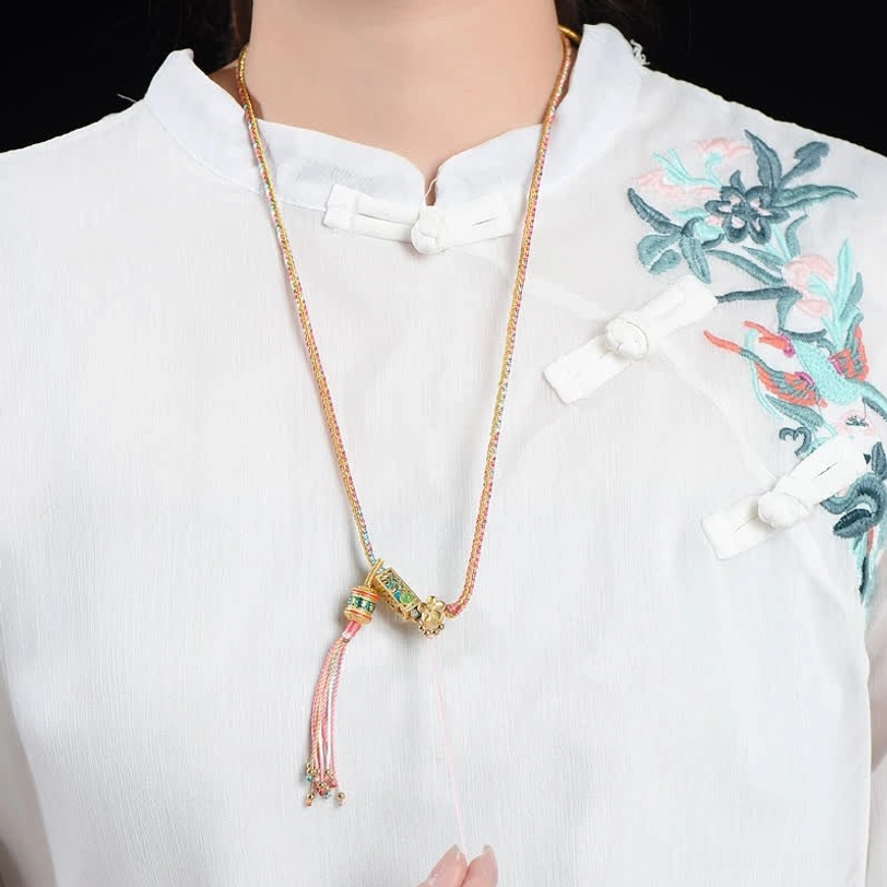 Tibetan braided necklace with yellow-green-blue rope enamel green stone charm and decorative bead