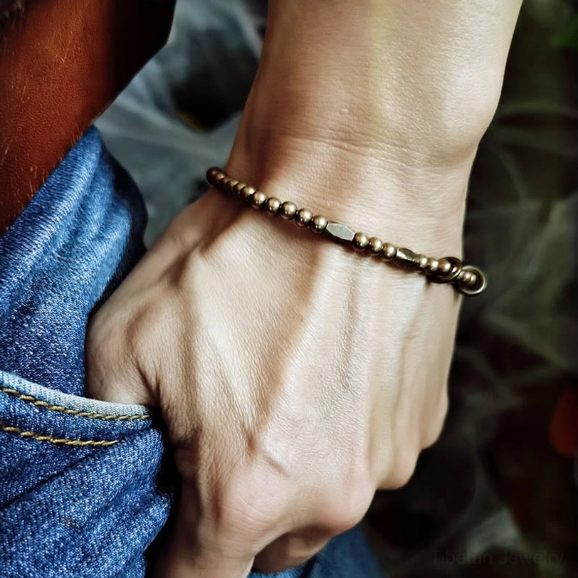 Tibetan brass couple bracelet energy healing symbol spiritual protection and balance for two souls