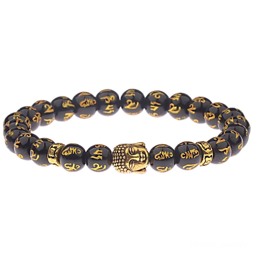 Tibetan Om Mani Padme Hum Buddha bracelet with black glossy beads, gold Sanskrit mantra engravings, and gold Buddha charm on white background