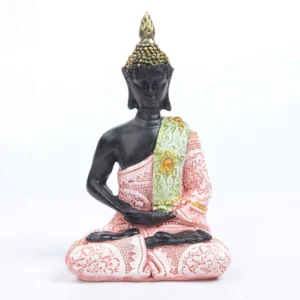 Tibetan Buddha feng shui meditation statue with pink and light green robes, embossed floral patterns, hands in meditation mudra position, black resin body with gold decorative accents