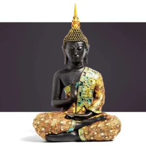 Handcrafted Tibetan Buddha resin statue with black matte body and gold-teal embroidered robes in prayer mudra pose, small size 11cm
