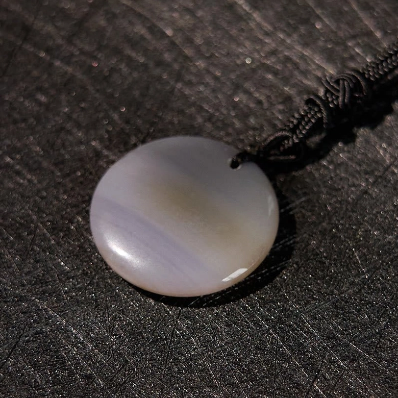 Vajra Dorje Tibetan Buddhist necklace pendant with natural crystal and golden Sanskrit engravings