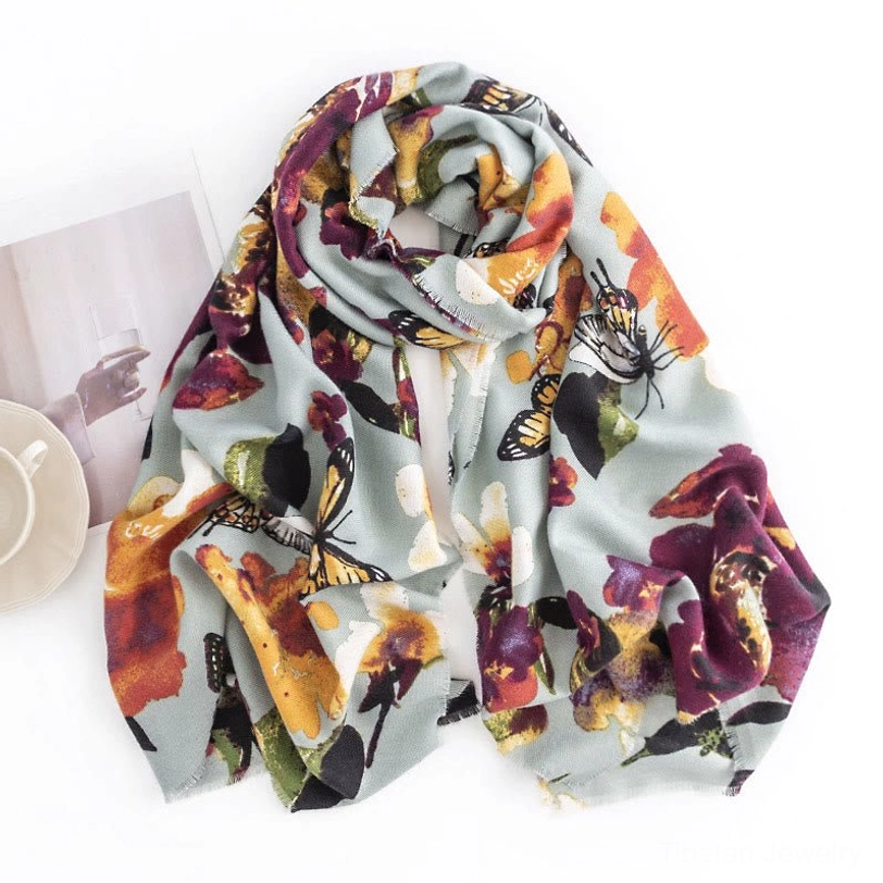 Coiled Tibetan butterfly flower scarf showing natural soft drape and wrapping style