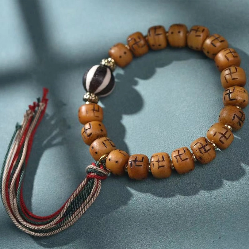 Tibetan protection bracelet with natural camel bone beads and black white dzi bead - traditional Buddhist amulet jewelry