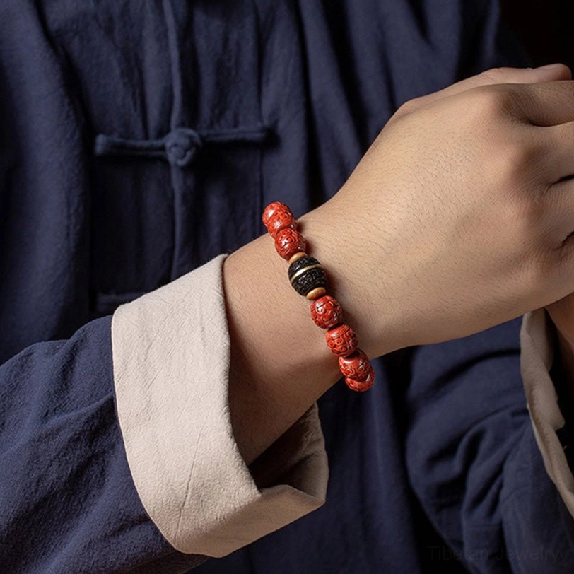 Cinnabar ebony blessing bracelet worn on right wrist with traditional Hanfu clothing, side view showing slim fit and carved bead design