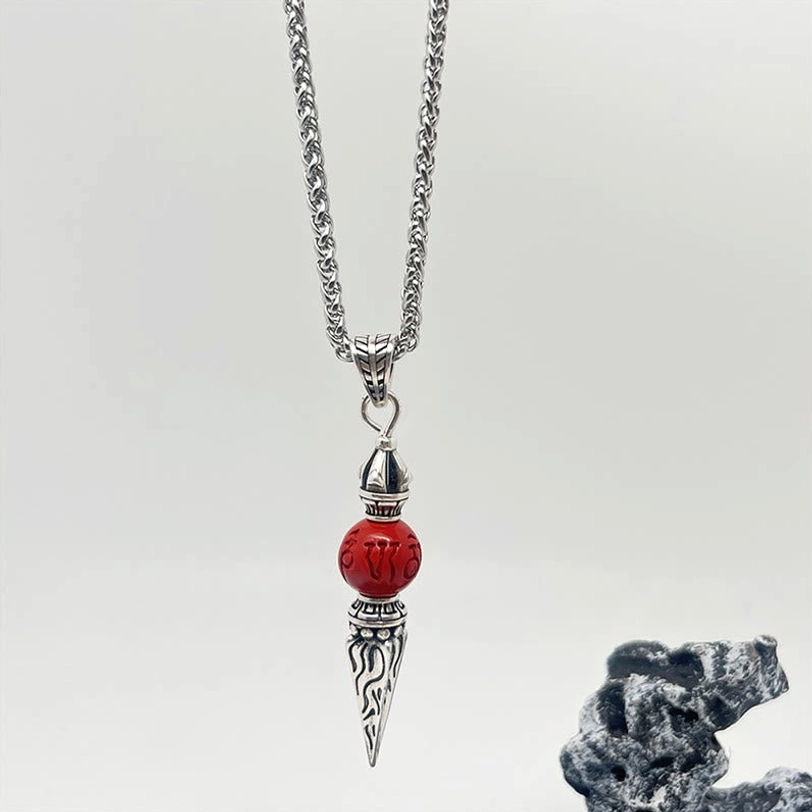 Complete Tibetan cinnabar dorje necklace full view with wheat-link silver chain and integrated pendant