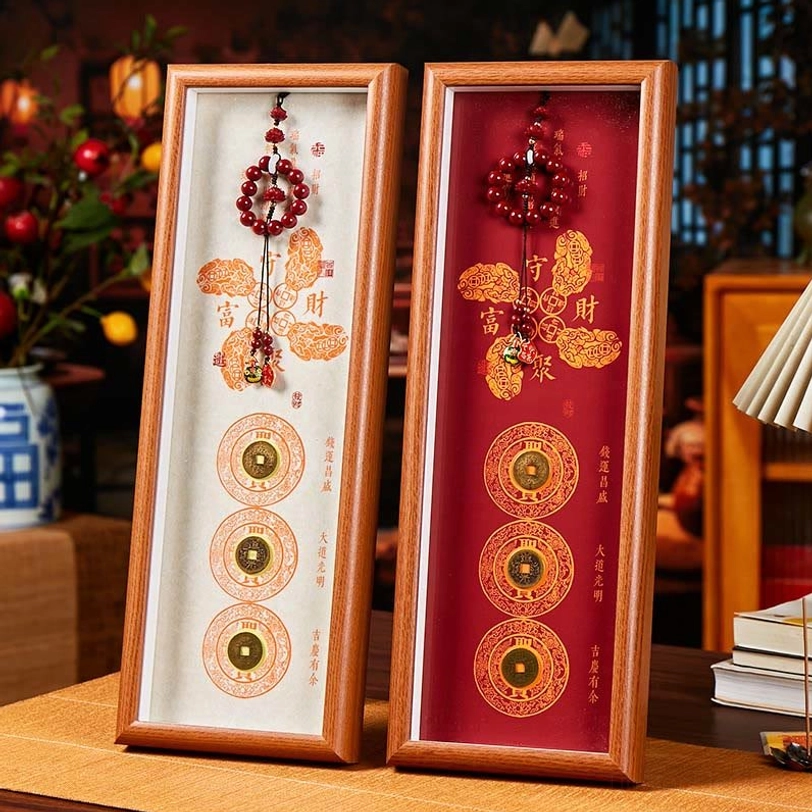 Pair of Tibetan cinnabar copper coin fortune photo frame ornaments displayed side-by-side