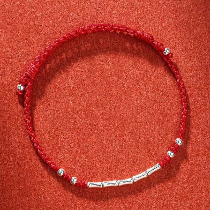Classic red Tibetan handmade braided protection bracelet with silver copper beads, traditional design for spiritual practice