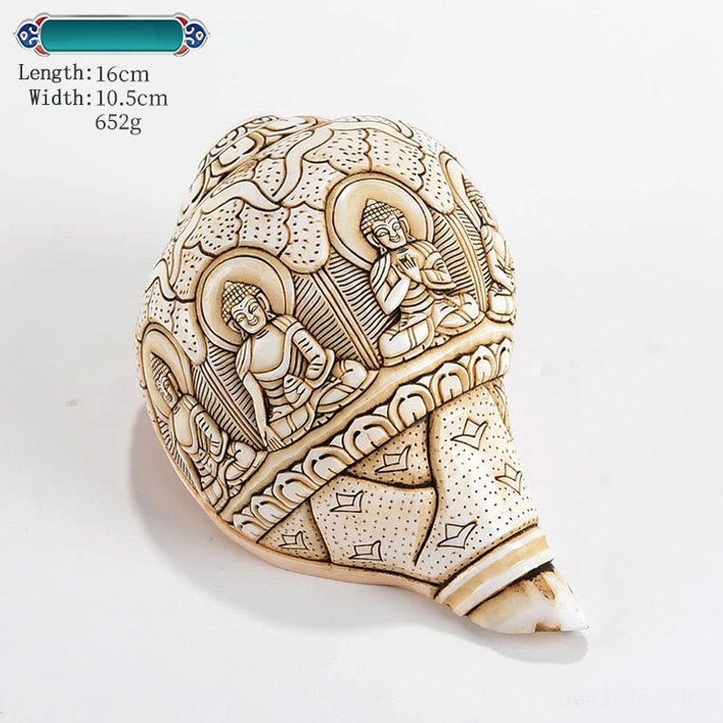 Tibetan handcrafted conch shell with intricate deity carving and cloud motif patterns authentic Buddhist art