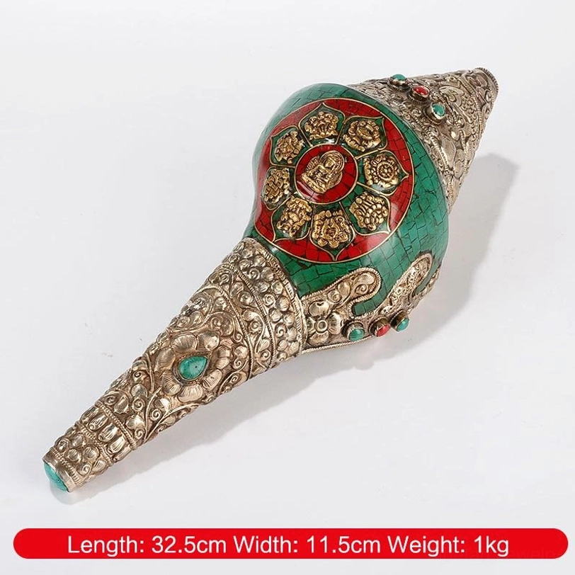 Eight auspicious symbols Sakyamuni style Tibetan conch shell ornament displaying Buddha mandala and sacred iconography with turquoise accents