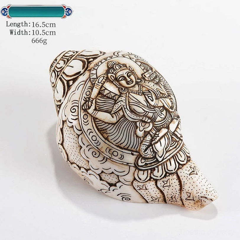 Hand-engraved Tibetan conch shell decoration featuring sacred Buddhist symbol and traditional artisan craftsmanship