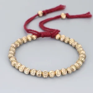 Red Tibetan copper bead luck bracelet with tassel drawstring - handmade natural cotton and copper beads