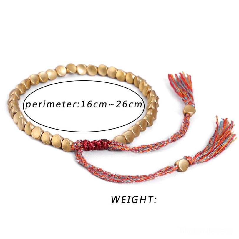 Adjustable perimeter Tibetan copper bracelet showing 16cm to 26cm size range with woven strap