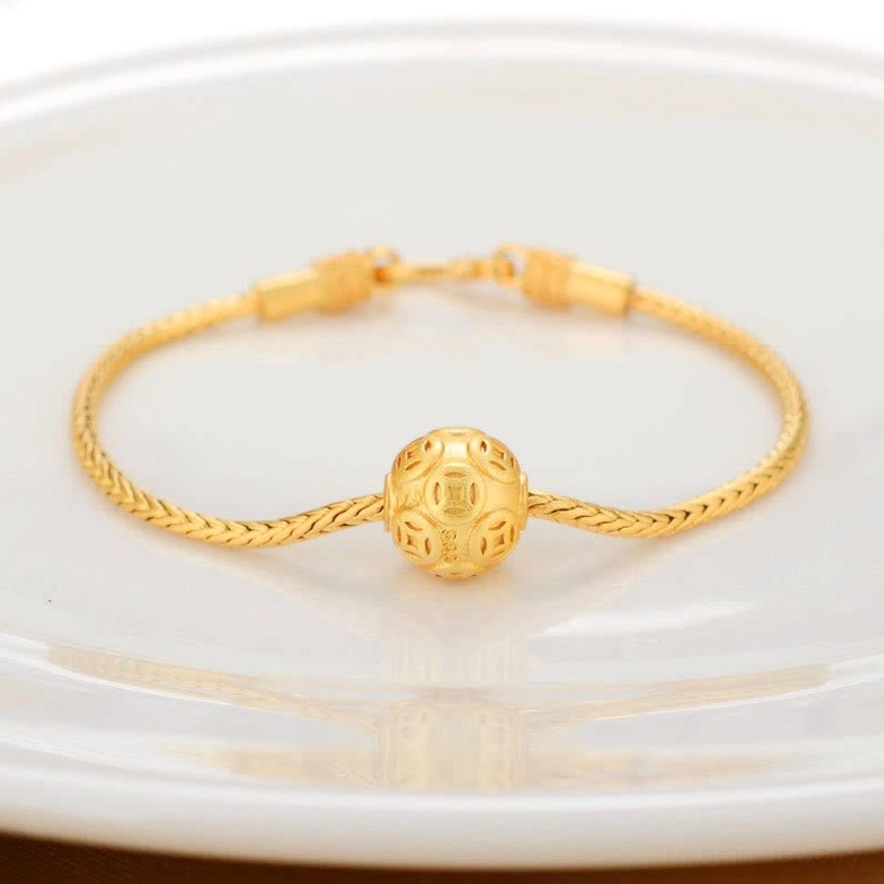Copper coin charm Tibetan bracelet with embossed traditional coin symbol