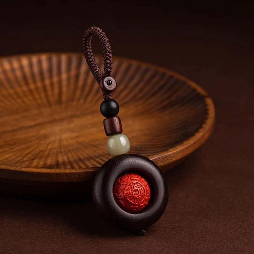 Tibetan copper coin wealth protection keychain with traditional fortune-bringing design