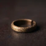 Tibetan vintage textured copper couple ring 4.5mm band width - three quarter side view showing distressed bronze grain finish and adjustable open band design