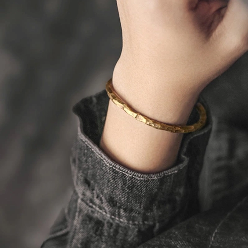 Tibetan energy conductor copper cuff bracelet showing spiritual significance and prosperity symbol meaning