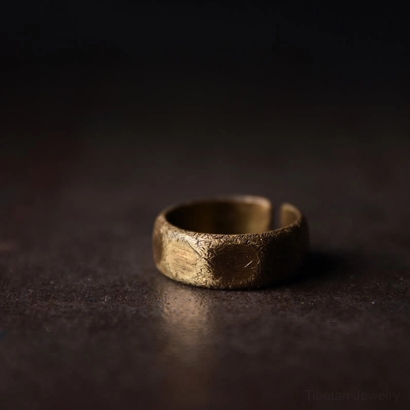 Wide band copper prosperity ring - flat side view displaying open slit adjustable design and frosted finish