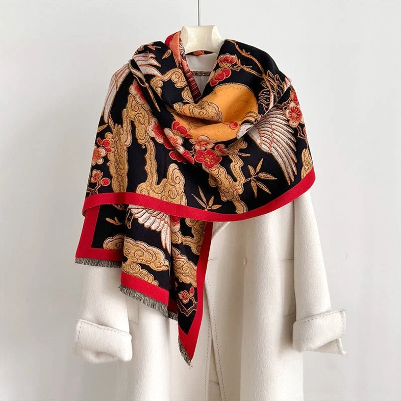 Black Tibetan crane plum blossom jacquard scarf worn on mannequin, showcasing auspicious cloud pattern with red trim