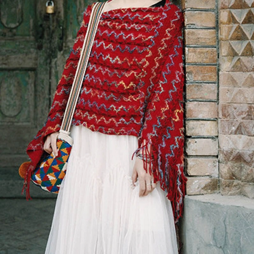 Tibetan cultural striped tassel shawl representing Himalayan heritage and spiritual symbolism